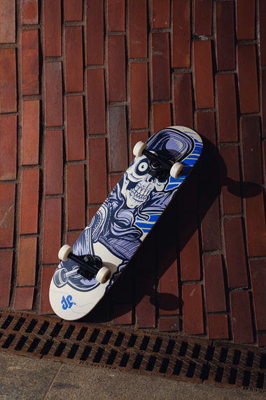 Kompletní městský sportovní modrý skateboard Skeleton 7.75"