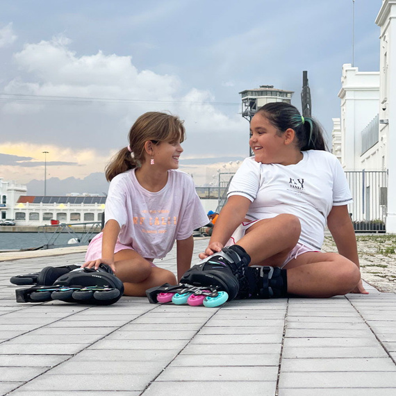 Story Motion Nastavitelné inline brusle růžovo-černé